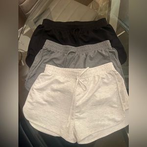 Three pairs of athletic shorts, brand unknown
